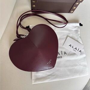 Alaïa Deep Berry Heart Crossbody Bag